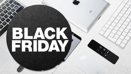 Black Friday Schriftzug mit Apple-Produkten im Hintergrund